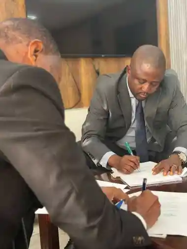 Click, tap, or press Enter to enlarge Signing of a Service Level Agreement involving Attorneys 4 All and the Ministry of Justice